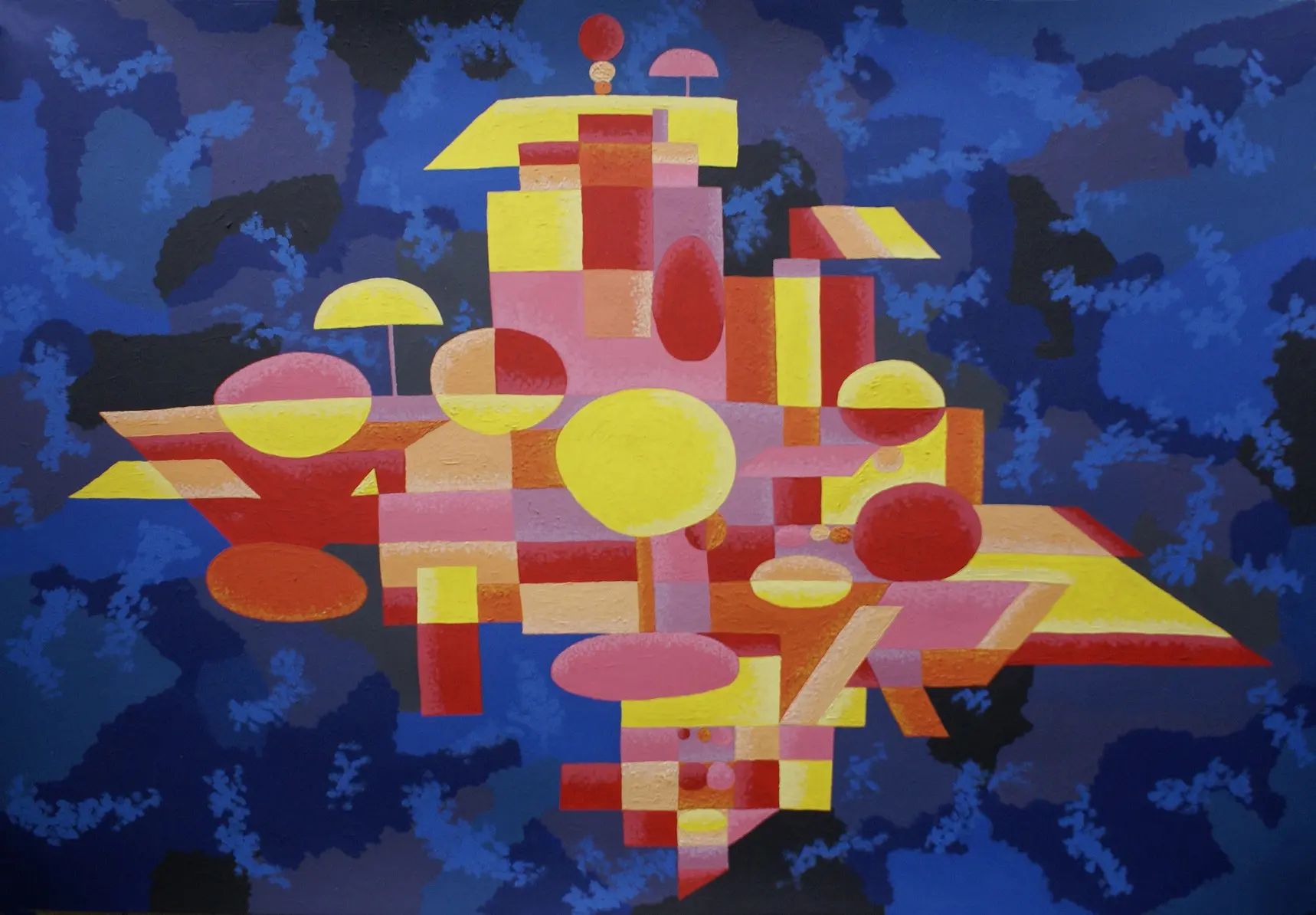 Red and yellow geometric structure suspended over a blue ground